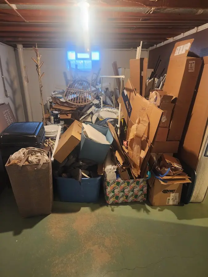 Roll-off dumpster container at job site for 4 Yard Dumpster Rental in Lake Tansi